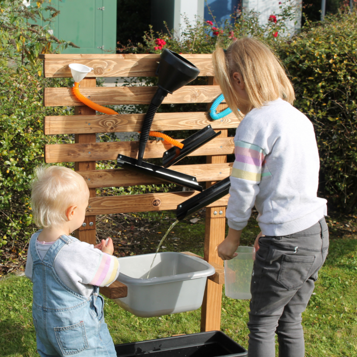 children playing with water wall